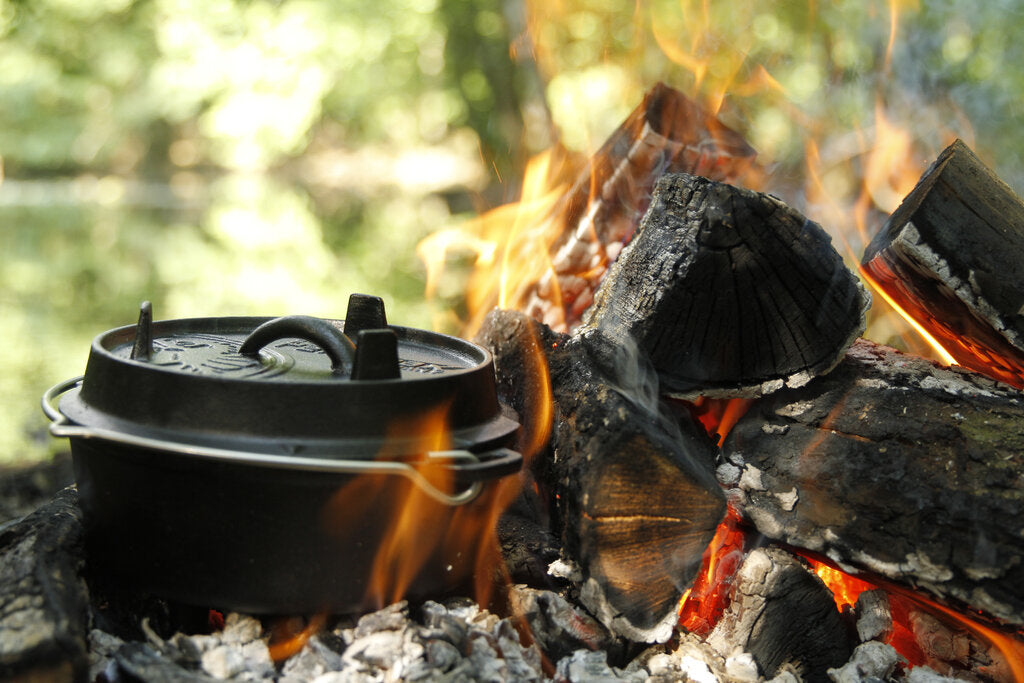 Dutch Oven Cooking On The BBQ Or Over An Open Fire